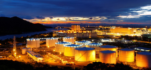 Illuminated petroleum tank farm and terminal infrastructure at night
